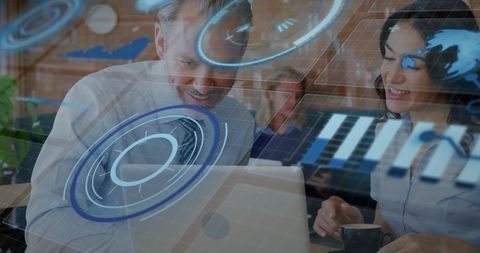 Business team collaborating over laptop in cafe viewing augmented reality UI holograms