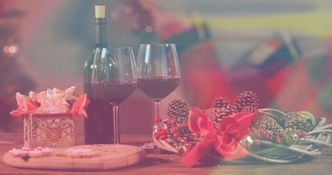 Celebrating Holiday Cheer with Red Wine, Pinecone Wreath and Festive Cookies