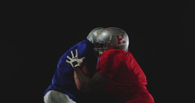 Football Players Tackle during Game on Black Background - Download Free Stock Images Pikwizard.com