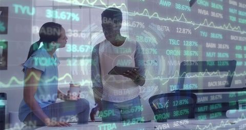 Diverse Professionals Discussing Data with Stock Market Overlay