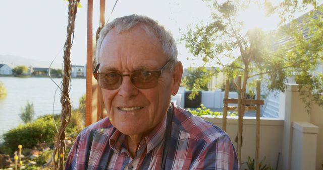 Senior Man Smiling Outdoors in Summer Sun - Download Free Stock Images Pikwizard.com