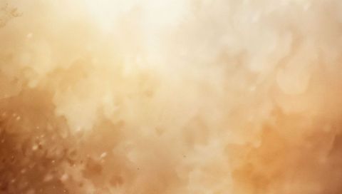 Warm Amber Bokeh Texture Featuring Soft Grain, Diffuse Glow and Subtle Particles