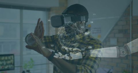 Man with VR Headset Interacting with Virtual Augmented Reality Interface - Download Free Stock Images Pikwizard.com
