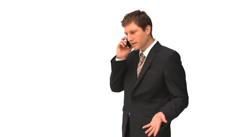 Businessman Confidently Communicating on Smartphone