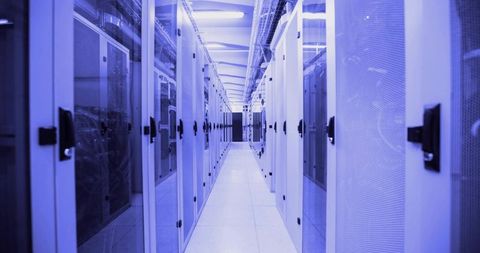 Long Corridor in a Modern Data Center with Server Racks and Technology Infrastructure