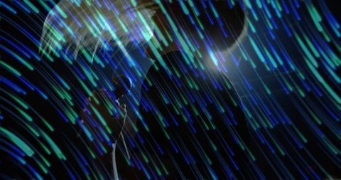 Female silhouette posing with teal neon streaks, glowing backlight and couple profiles