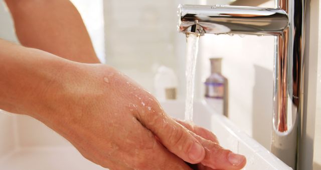 Close-up of Hands Washing Under Running Water in Sink for Hygiene and Cleanliness - Download Free Stock Images Pikwizard.com