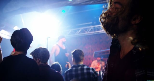 Energetic Concert Crowd Under Vibrant Stage Lights - Download Free Stock Images Pikwizard.com