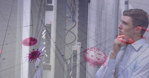 Technology Engineer Contemplating Virus Data in Server Room