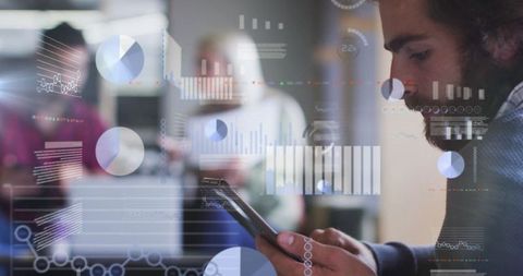 Innovative Team Analyzing Digital Financial Data Graphics in Modern Office - Download Free Stock Images Pikwizard.com