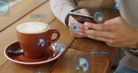 Modern coffee break at technology-driven cafe table