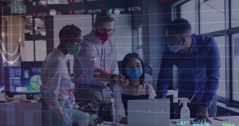 Diverse Colleagues Analyzing Stock Data in Office Environment