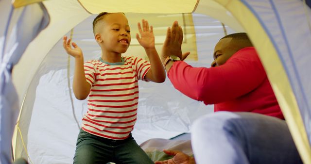 Father and Son Playing Inside Tent, Enjoying Quality Time - Download Free Stock Images Pikwizard.com