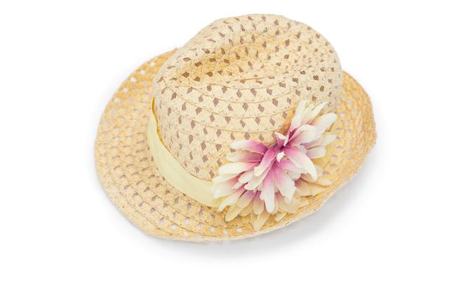 Close-up of beach hat with flower