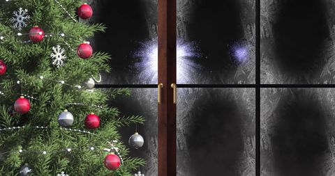 Christmas Tree by Frosted Window with Fireworks