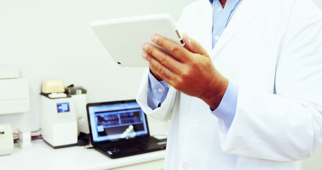 Doctor Using Digital Tablet in Modern Medical Office - Download Free Stock Images Pikwizard.com