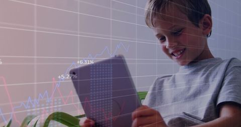 Child Engaged in Digital Learning with Tablet and Data Projections