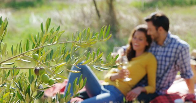 A young Caucasian couple enjoys a romantic moment in a natural outdoor setting, with copy space - Download Free Stock Photos Pikwizard.com