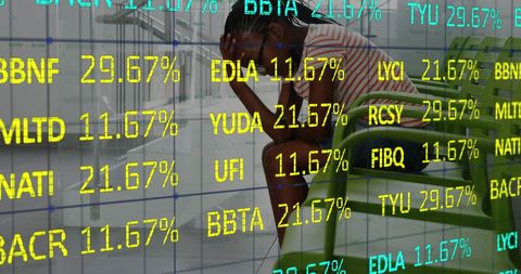 Digital overlay of finance data and worried woman waiting