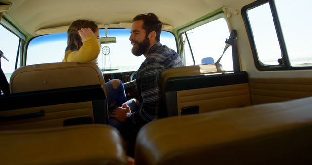 Smiling Couple Sitting in Vintage Van Facing Each Other - Download Free Stock Images Pikwizard.com