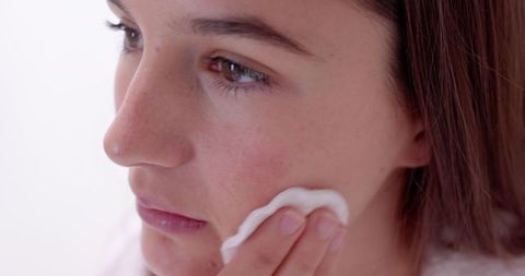 Woman Cleansing Facial Skin Early Morning Routine