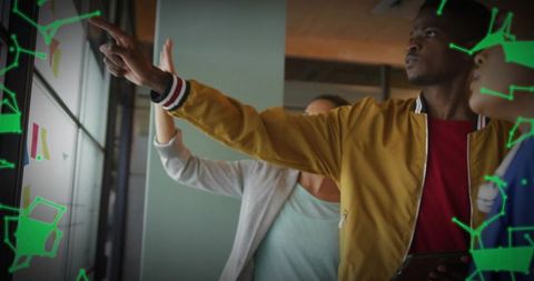 Team Presenting on Glass Wall with Pointing Man in Mustard Jacket and AR Overlays