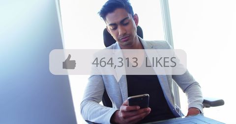 Confident Professional Checking Social Media Likes on Smartphone