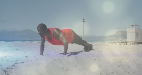 Athletic Man Doing Push-Ups on Sunny Beach
