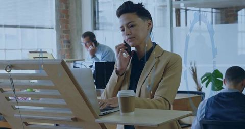 Professional asian woman navigating modern office technology