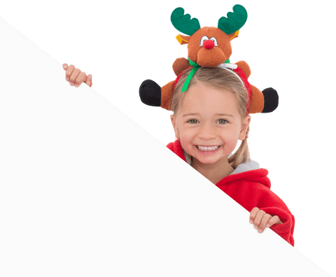 Smiling girl with reindeer hat holding transparent holiday banner
