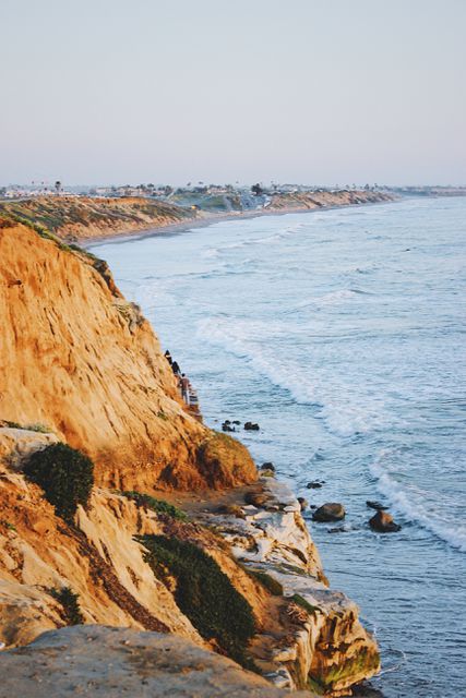 Scenic Coastal Cliffside with Panoramic Ocean View at Sunset - Download Free Stock Images Pikwizard.com