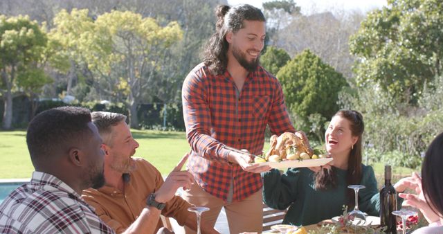 Group of Friends Enjoying Outdoor Thanksgiving Feast in Backyard - Download Free Stock Images Pikwizard.com