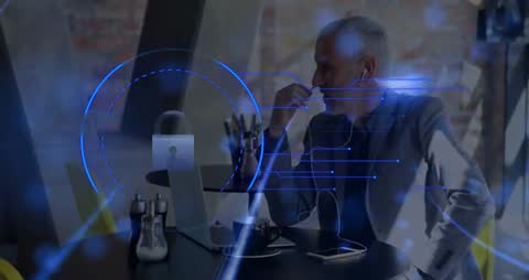 Professional Man Engaging with Cybersecurity Concepts in Modern Café