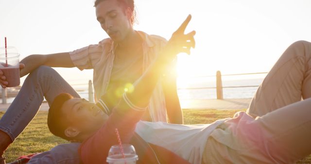 Friends Relaxing Outdoors in Sunset Glow - Download Free Stock Images Pikwizard.com