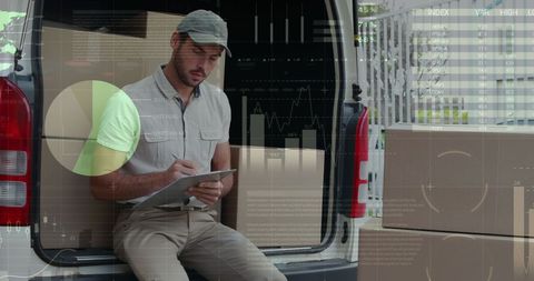 Delivery Man Analyzing Financial Data on Online Logistics Network - Download Free Stock Images Pikwizard.com
