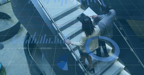 Business Professionals Analyzing Data on Stairwell