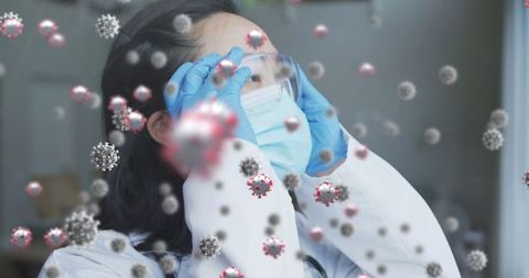 Stressed Medical Professional Amid COVID-19 Virus Cells