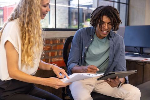 Diverse workforce collaborating in modern office setting