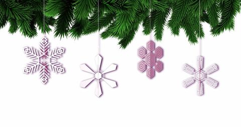 Festive snowflake decorations on fir branches