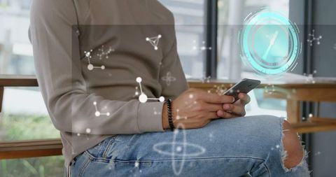 Digital Interface Overlay on Businessman Using Smartphone