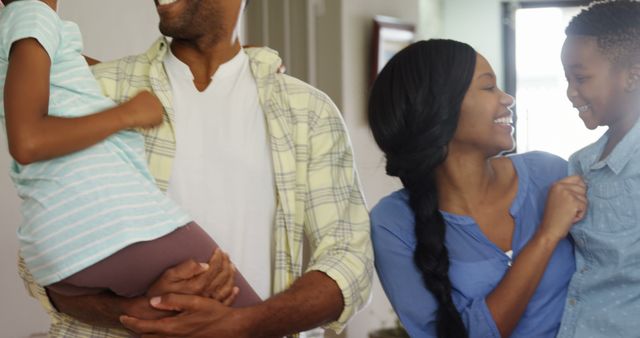 Happy African American Family Hugging Together at Home - Download Free Stock Images Pikwizard.com