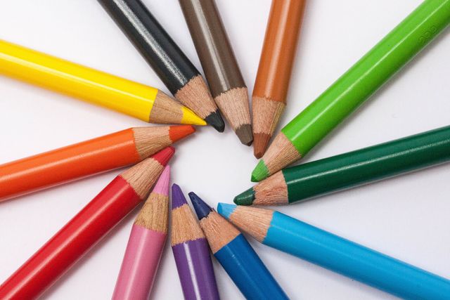 Color Pencils Arranged in Circular Pattern on White Background - Download Free Stock Photos Pikwizard.com