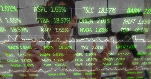 Businesswoman Analyzing Financial Data Through VR Technology