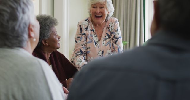 Happy Senior Woman Laughing with Friends - Download Free Stock Images Pikwizard.com