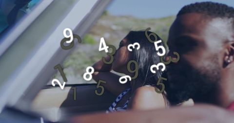 Couple Enjoying Road Trip in Convertible on Coastal Route