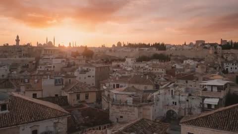 Panning at sunset over historic terracotta rooftops, domes and minarets