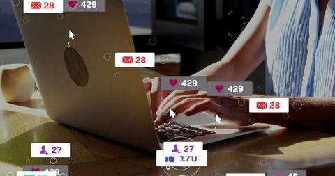 Woman typing on laptop with floating social media notifications and like badges