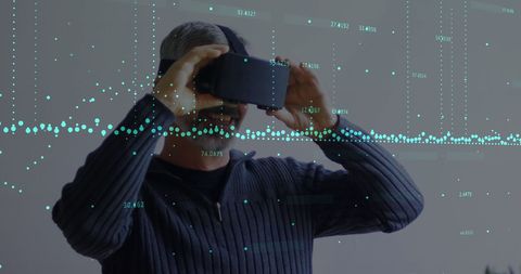 Man Using VR Headset Experiencing Digital Data Overlay