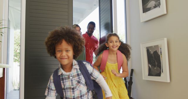 Happy Family Returning Home with Excited Children Running Inside - Download Free Stock Images Pikwizard.com