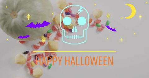 Halloween greeting with candy and pumpkin decorations